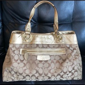 Coach Gold monogram. signature bag